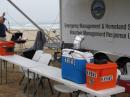 Set up almost completed.  The overcast Saturday morning coolness helped to ease the set up.  The orange box is a large gel-cell "go power box" and the blue unit is a homebrew portable air conditioner unit, very useful as the temperatures rise.